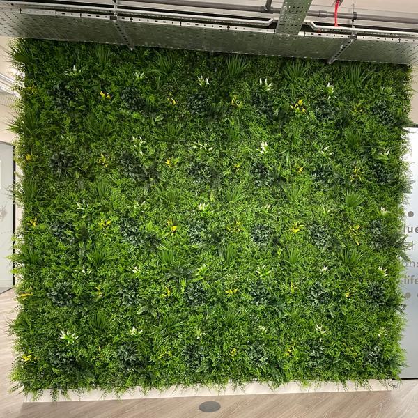 Artificial Green Wall Panels Ferns Grasses Palm Heads & Various Bushes in Green Yellow and White Pure Clean Rental Solutions