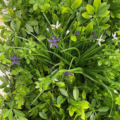 Artificial Living Wall Panel with Mixed 3d Light-Dark Green Foliage with Purple & White Flowers Pure Clean Rental Solutions